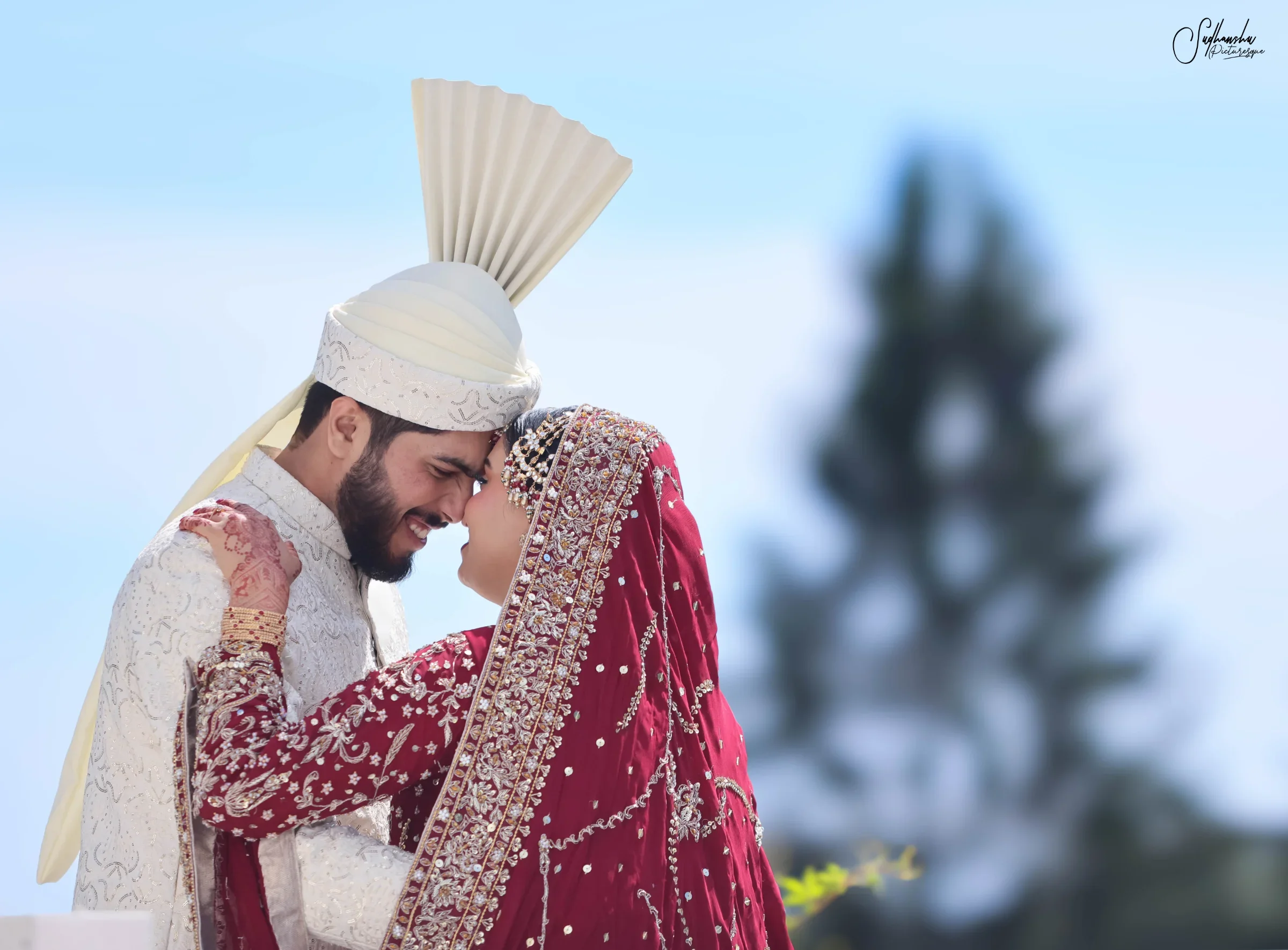 A bride and groom together outdoors on their wedding day, photographed by Sudhanshu Picturesque